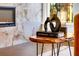 Cozy living room featuring a modern fireplace and stylish decor on a wooden side table at 2505 Astaire Nw Ct, Atlanta, GA 30318