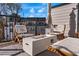 Cozy outdoor seating area with a modern fire pit and comfortable lounge chairs at 2505 Astaire Nw Ct, Atlanta, GA 30318