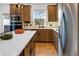 Bright kitchen featuring an island and hardwood floors at 2505 Astaire Nw Ct, Atlanta, GA 30318