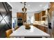 Modern kitchen with wood cabinets and large island at 2505 Astaire Nw Ct, Atlanta, GA 30318