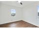 Bright bedroom with hardwood floors and ample natural light from the window at 2724 Larkspur Se Dr, Atlanta, GA 30316