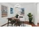 Cozy dining area with natural light, hardwood floors, and a stylish table setting at 2724 Larkspur Se Dr, Atlanta, GA 30316