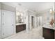 Elegant bathroom with double vanity, soaking tub, and marble tile at 613 Stone Field Nw Run, Marietta, GA 30060