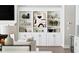 Stylish white built-in shelving unit with decorative accents at 613 Stone Field Nw Run, Marietta, GA 30060