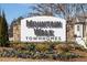 Community entrance sign for Mountain Walk Townhomes at 613 Stone Field Nw Run, Marietta, GA 30060