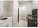 Bright laundry room with washer, dryer, and a sink at 613 Stone Field Nw Run, Marietta, GA 30060