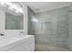 Modern bathroom with double vanity and a large walk-in shower at 1816 Evans Dr, Atlanta, GA 30310