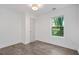 Well-lit bedroom featuring hardwood floors and a window at 1816 Evans Dr, Atlanta, GA 30310