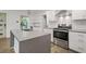 Modern kitchen with stainless steel appliances and white cabinets at 1816 Evans Dr, Atlanta, GA 30310