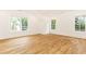 Well-lit bedroom with hardwood floors and multiple windows at 2624 Forrest Ne Way, Atlanta, GA 30305