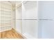 Large walk-in closet with ample shelving and hanging space at 2624 Forrest Ne Way, Atlanta, GA 30305