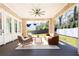 Relaxing covered porch with wicker seating and a ceiling fan at 2624 Forrest Ne Way, Atlanta, GA 30305