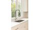 Modern kitchen sink with a sleek, high-arc faucet at 2624 Forrest Ne Way, Atlanta, GA 30305