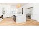 Sleek kitchen boasts stainless steel appliances and white cabinetry at 2624 Forrest Ne Way, Atlanta, GA 30305