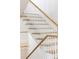 Modern staircase with white spindles and light wood treads at 2624 Forrest Ne Way, Atlanta, GA 30305