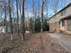 House backyard with patio and wooded area at 280 E Valley Dr, Marietta, GA 30068