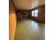 Finished basement with fireplace and wood paneling at 280 E Valley Dr, Marietta, GA 30068