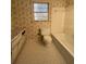 Bathroom with vintage fixtures and patterned wallpaper at 280 E Valley Dr, Marietta, GA 30068