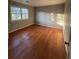 Bedroom with hardwood floors and floral wallpaper at 280 E Valley Dr, Marietta, GA 30068