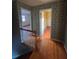 Upper hallway with wood floors and wallpaper at 280 E Valley Dr, Marietta, GA 30068