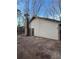 Rear exterior view of house with brick and siding at 280 E Valley Dr, Marietta, GA 30068