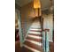 Staircase with wood and painted railing at 280 E Valley Dr, Marietta, GA 30068