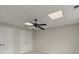 Bright basement bedroom with ceiling fan and double closets at 4562 Worthings Dr, Powder Springs, GA 30127