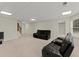 Finished basement with rec area and stairs at 4562 Worthings Dr, Powder Springs, GA 30127