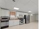 Basement kitchen with stainless steel appliances at 4562 Worthings Dr, Powder Springs, GA 30127