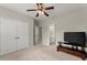 Spacious bedroom with double doors and ensuite bathroom at 4562 Worthings Dr, Powder Springs, GA 30127