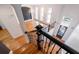 Elegant staircase with hardwood floors and wrought iron railing at 1938 Saxon Valley Ne Cir, Atlanta, GA 30319