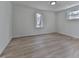 Bright bedroom featuring new flooring and large window at 337 Theodore Cox Cir, Canton, GA 30114