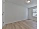 Bright bedroom with hardwood floors and large window at 337 Theodore Cox Cir, Canton, GA 30114