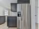 Stainless steel refrigerator in newly remodeled kitchen at 337 Theodore Cox Cir, Canton, GA 30114