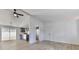 Open concept living and kitchen area with light flooring at 337 Theodore Cox Cir, Canton, GA 30114