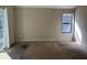 Spacious carpeted bedroom with sliding glass door to deck at 3763 Woodrose Ct, Snellville, GA 30039