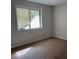 Simple bedroom with neutral walls and carpeting at 3763 Woodrose Ct, Snellville, GA 30039