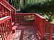 Back deck with wooden steps and railing at 3763 Woodrose Ct, Snellville, GA 30039