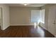 Bright entryway with hardwood floors and corner window at 3763 Woodrose Ct, Snellville, GA 30039
