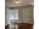 Bright entryway with hardwood floors and a corner window at 3763 Woodrose Ct, Snellville, GA 30039