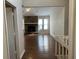 Living room with hardwood floors, fireplace, and vaulted ceiling at 3763 Woodrose Ct, Snellville, GA 30039