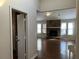 Bright living room with hardwood floors and a stone fireplace at 3763 Woodrose Ct, Snellville, GA 30039