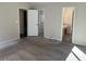 Bright main bedroom with carpet, double closets, and ensuite bathroom at 3763 Woodrose Ct, Snellville, GA 30039