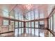 Bright sunroom with hardwood floors and fireplace at 72 Hazelwood Nw Rd, Cartersville, GA 30121