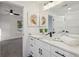 Modern bathroom with white vanity, black matte fixtures, and large mirror at 1732 Beecher Nw St, Atlanta, GA 30310