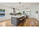 Modern kitchen with large island, stainless steel appliances, and white cabinetry at 1732 Beecher Nw St, Atlanta, GA 30310