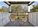 Cozy covered porch with small table and chairs, perfect for relaxing at 1732 Beecher Nw St, Atlanta, GA 30310