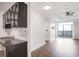 Modern kitchen with granite countertops and dark cabinetry at 325 E Paces Ferry Ne Rd # 2104, Atlanta, GA 30305