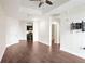 Hardwood floor living room, open concept kitchen and bathroom access at 325 E Paces Ferry Ne Rd # 2104, Atlanta, GA 30305