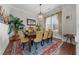 Elegant dining room with hardwood floors and stylish furnishings at 332 Symphony Se Way, Smyrna, GA 30080